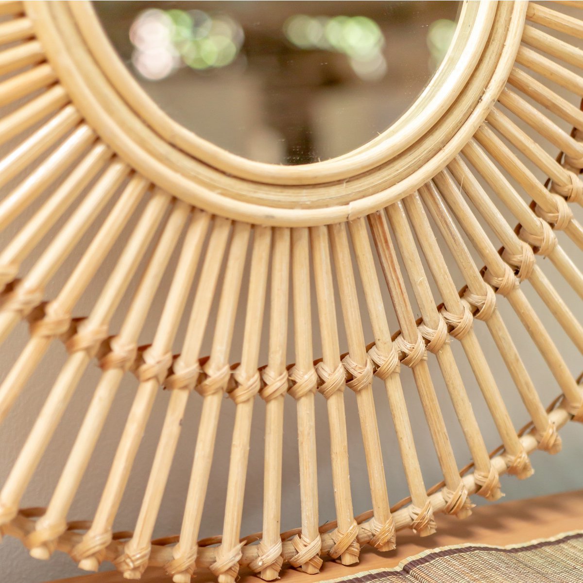 Boho-style round rattan mirror for living room décor by CozyVibe