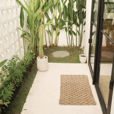 NIRAMA handwoven seagrass rug doormat for home décor by CozyVibe
