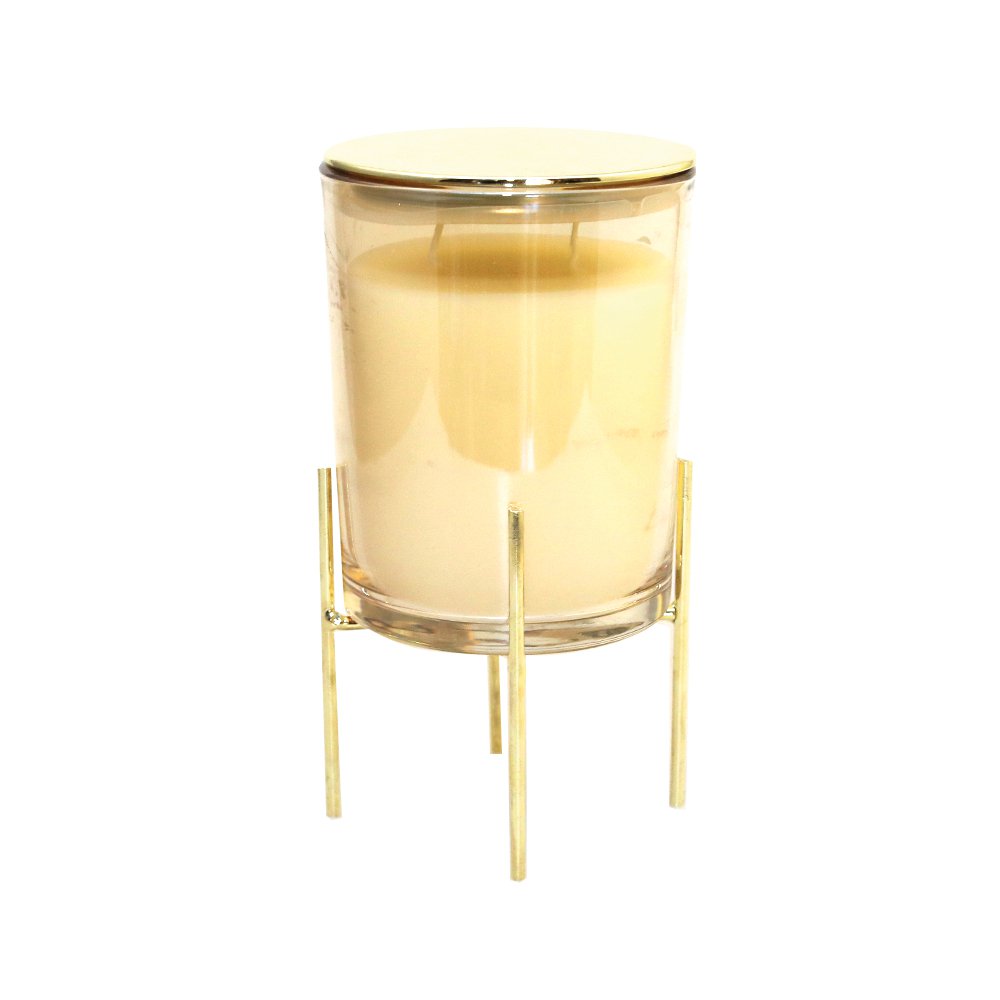 Golden candle with vanilla perfume on a gold metal support 10x10x17.5cm