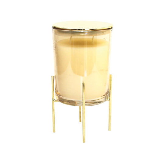 Golden candle with vanilla perfume on a gold metal support 10x10x17.5cm