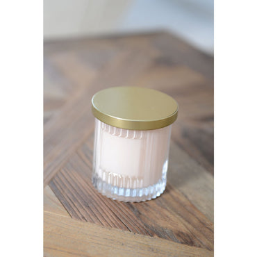 Candle with pink coconut scent and golden