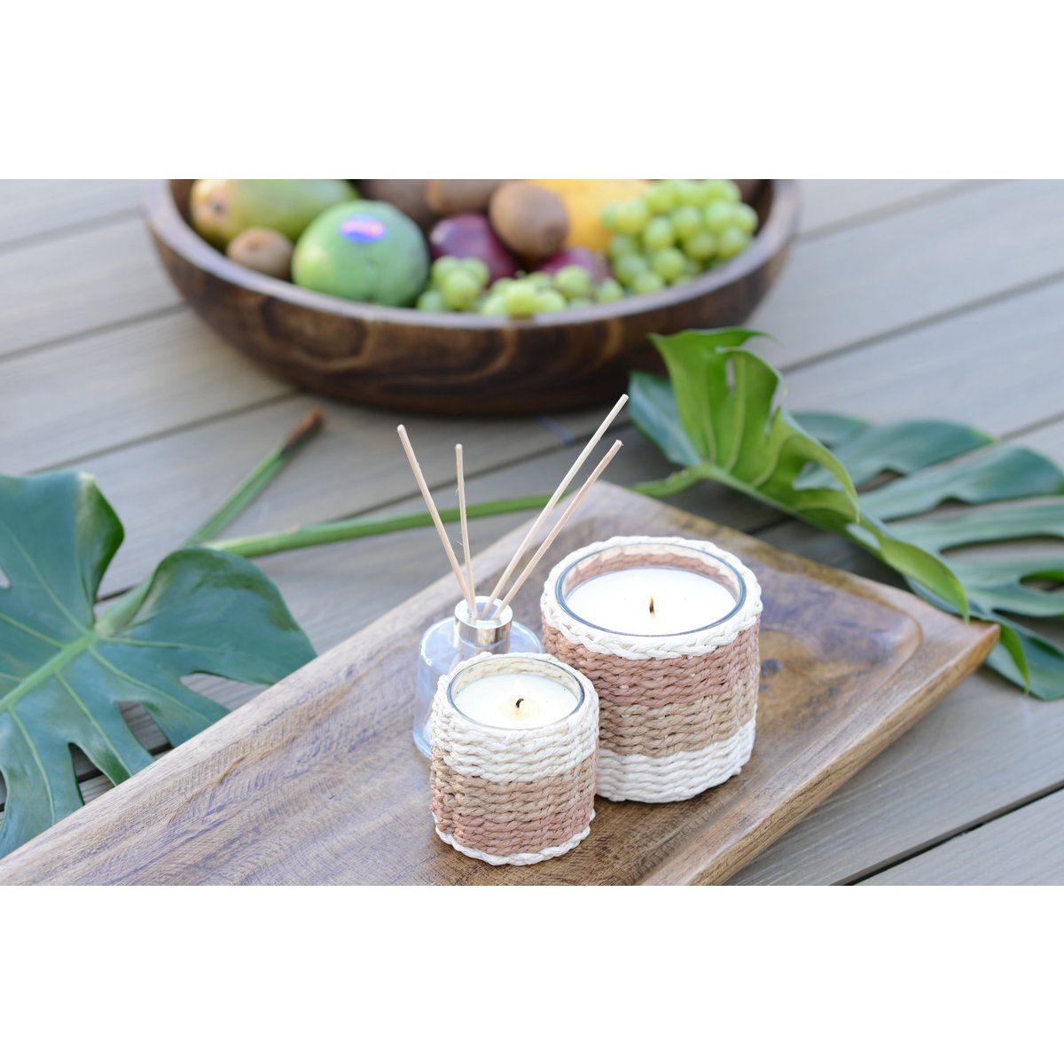 Brown and yellow braided glass candle with musk perfume