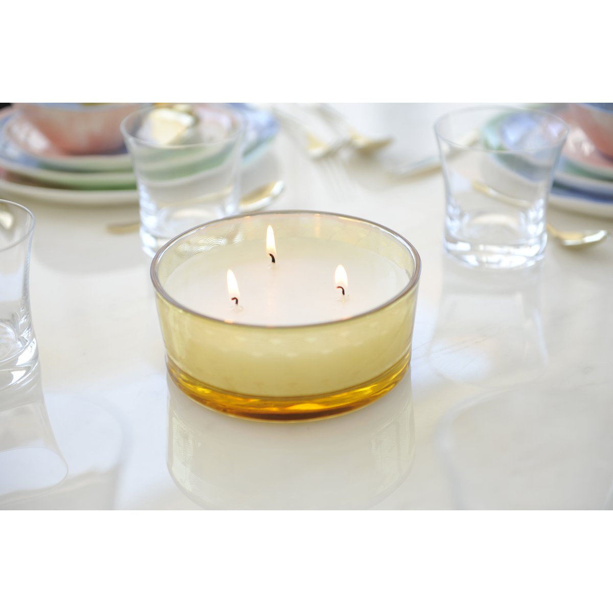 Golden glass vanilla candle