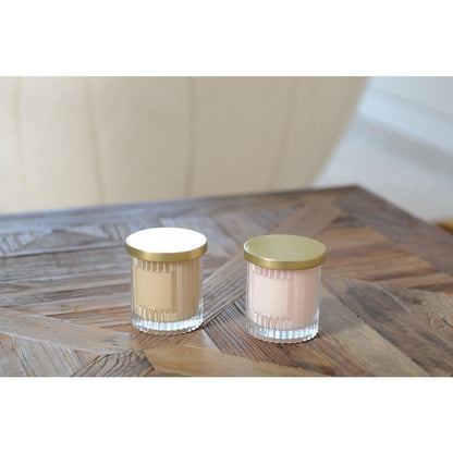Candle with pink coconut scent and golden