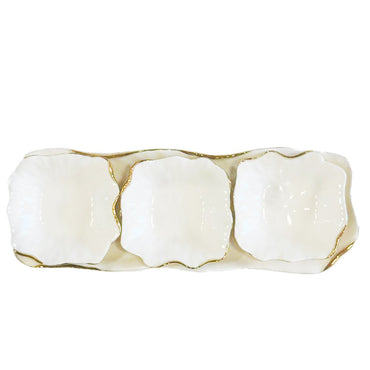 Snacks set of 3 bowls on a white porcelain tray with golden edges