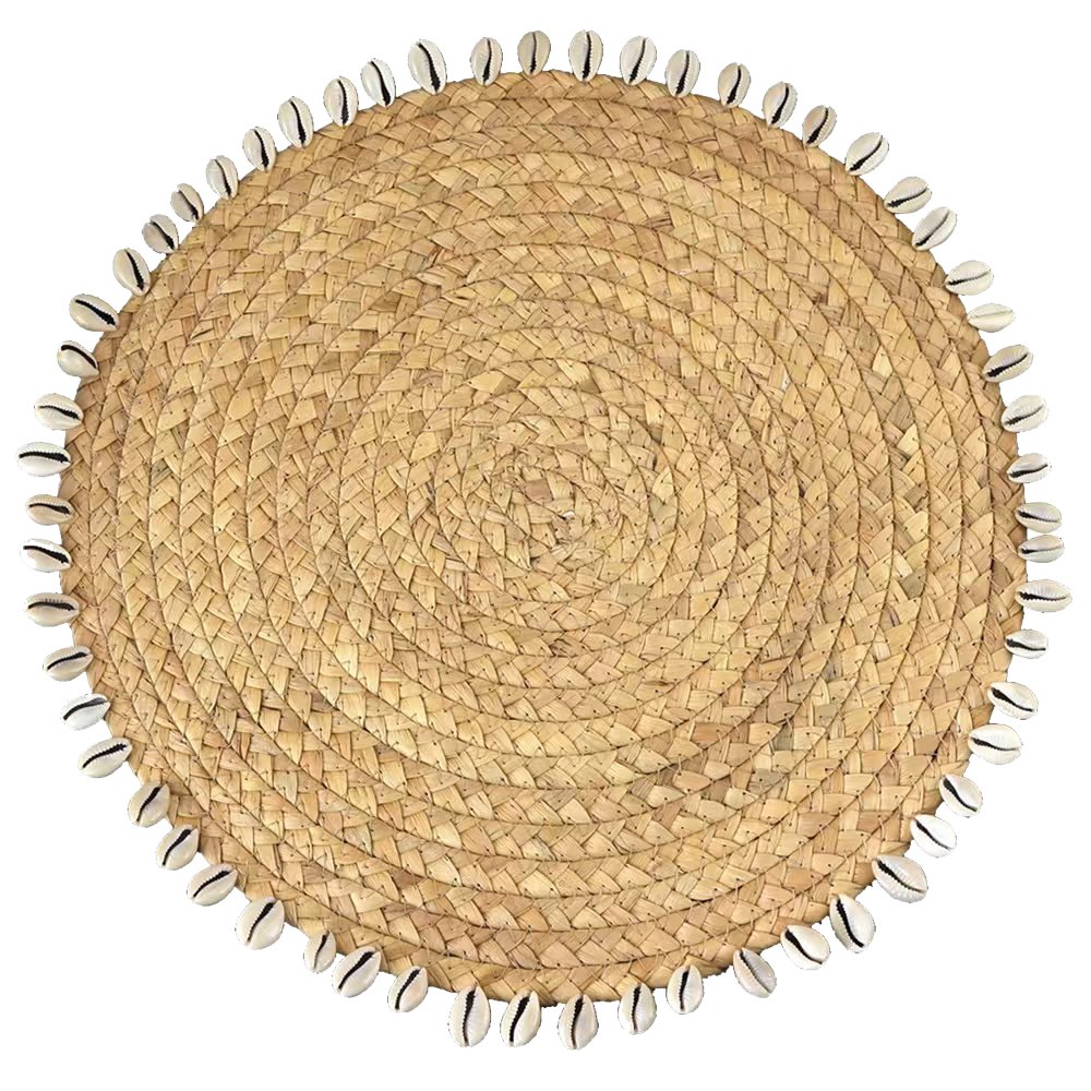 Natural wicker placemat with shells for elegant coastal table