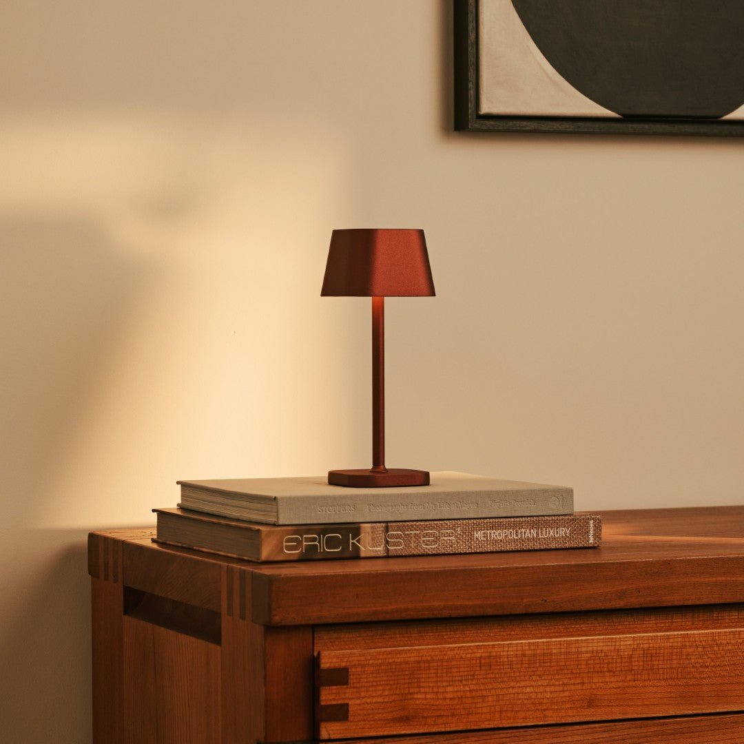 Ava Bronze metal table lamp completing cozy bedroom decor
