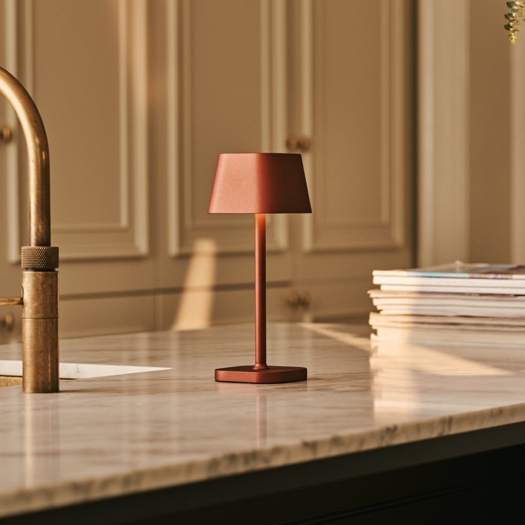 Ava Bronze rechargeable lamp adding soft light to kitchen counter