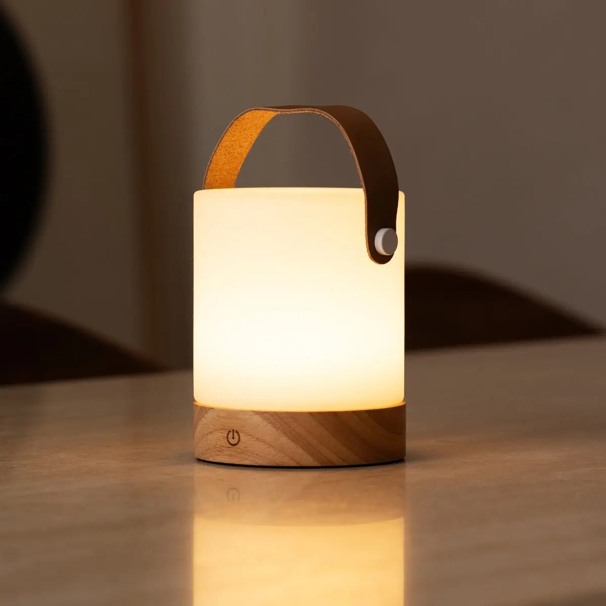 Elegant Avery Lamp providing warm cordless light for cozy interiors