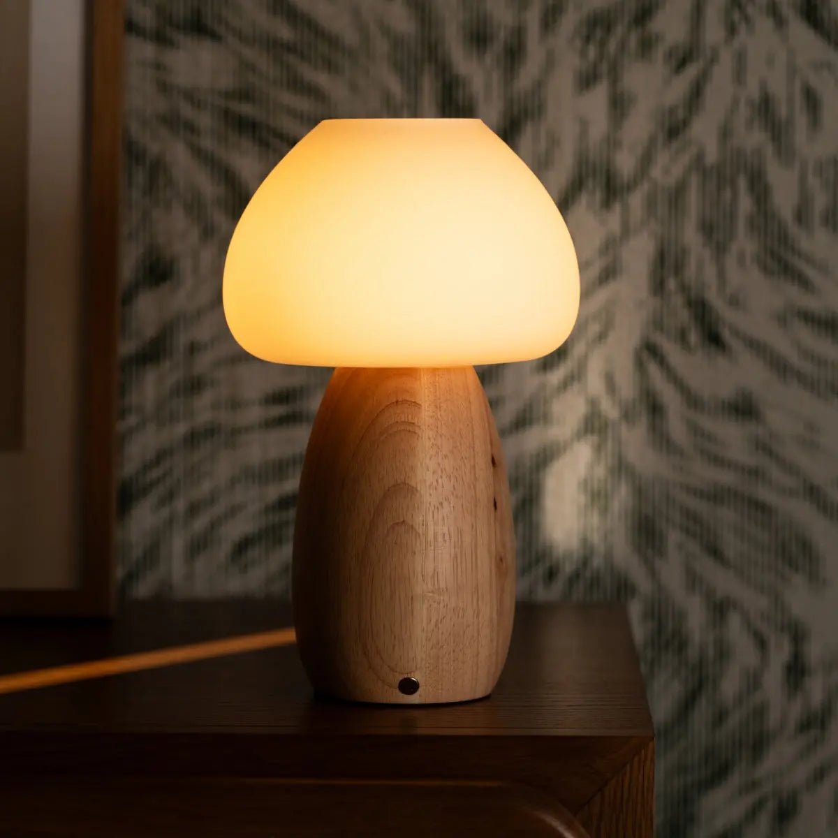 User adjusting brightness on Bear Lamp using simple touch dim feature