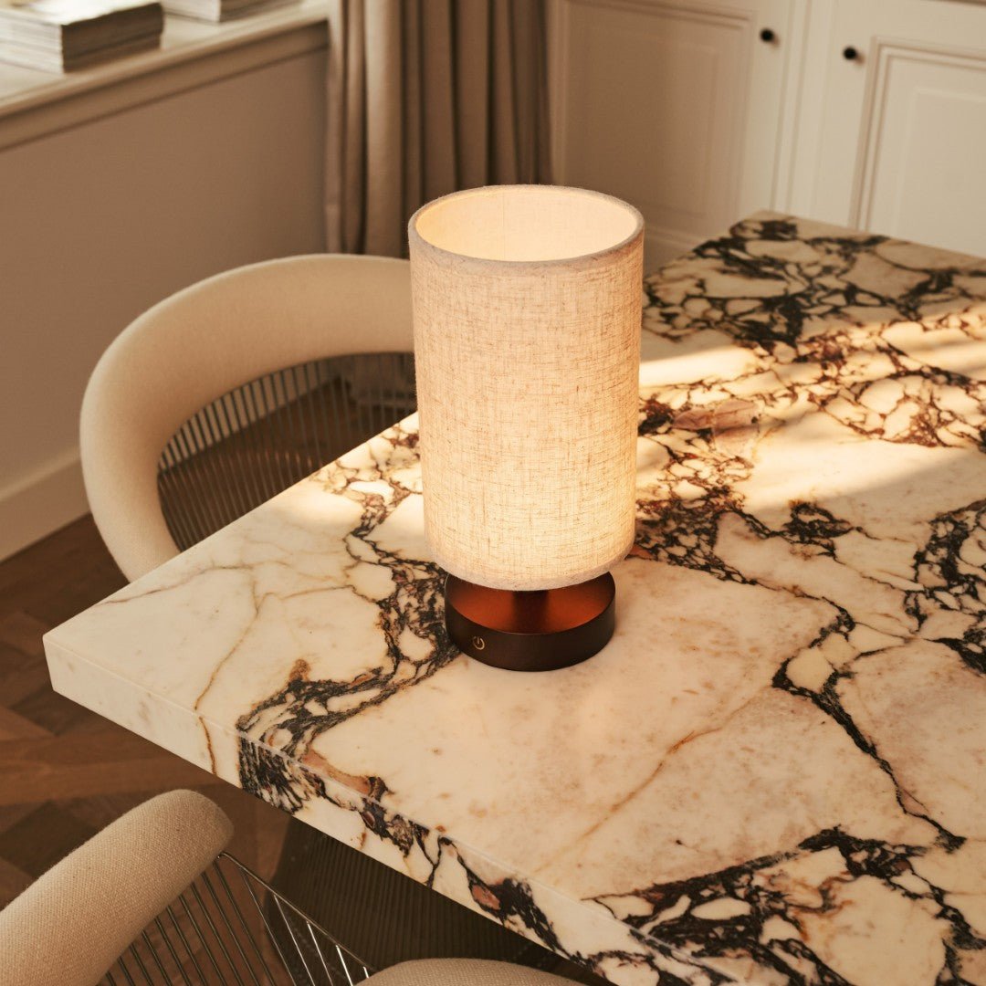 Warm glowing Ben Wooden Lamp enhancing cozy bedroom atmosphere
