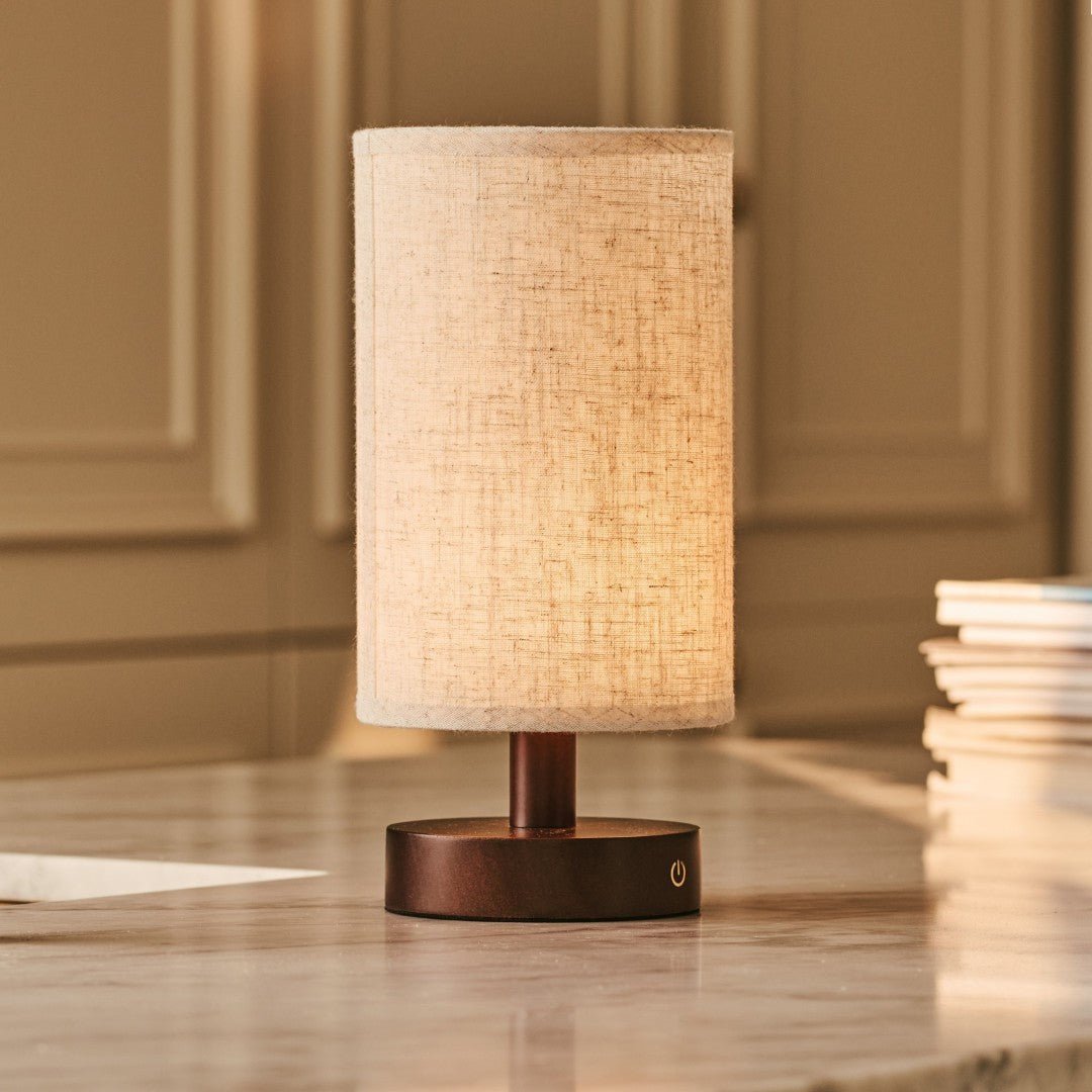 Stylish Ben Wooden Lamp providing warm ambient light on table