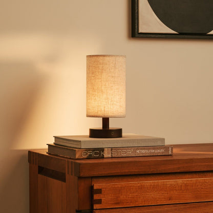 Elegant Ben Lamp crafted from rubberwood and soft fabric shade