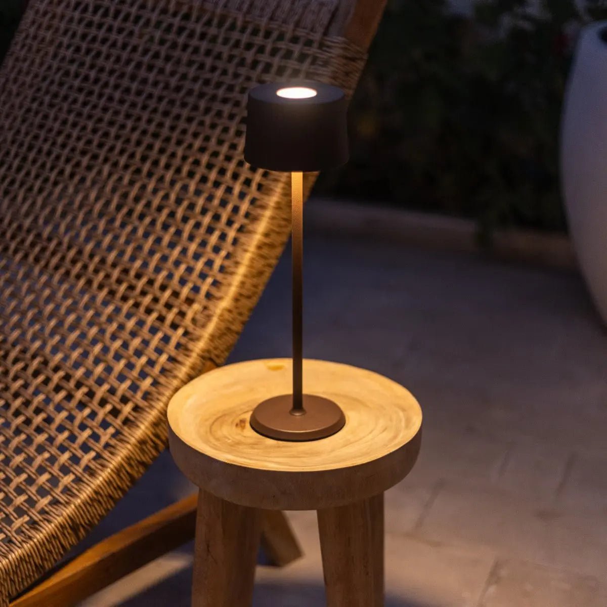 User adjusting David Lamp brightness with smooth dimmable touch control