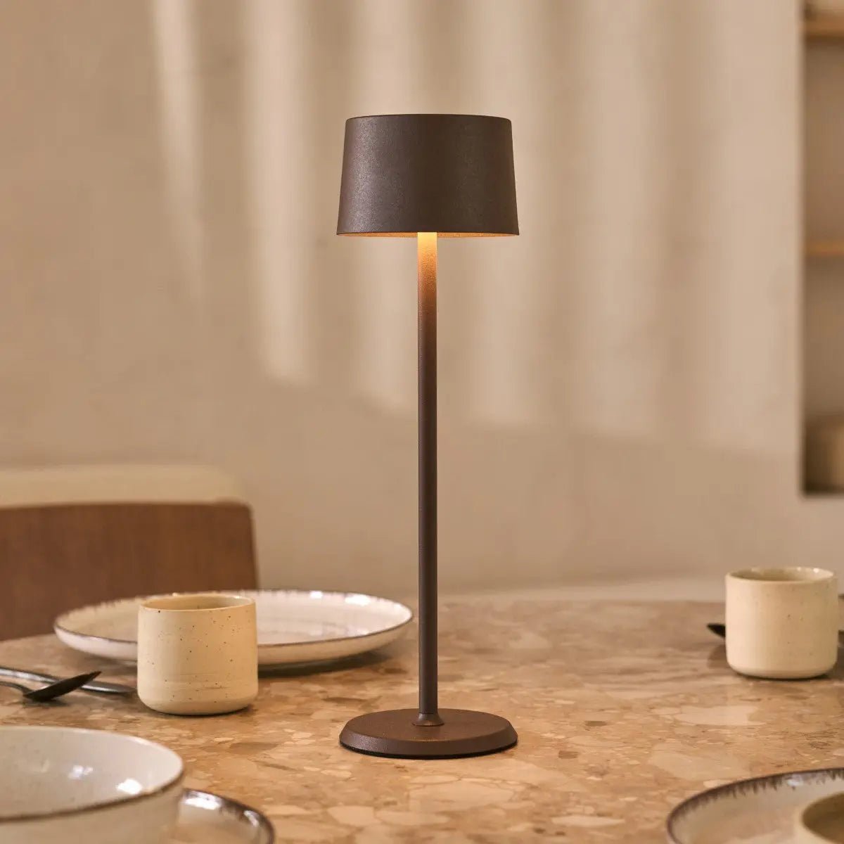 Elegant David Mocha Lamp providing cordless warm table lighting