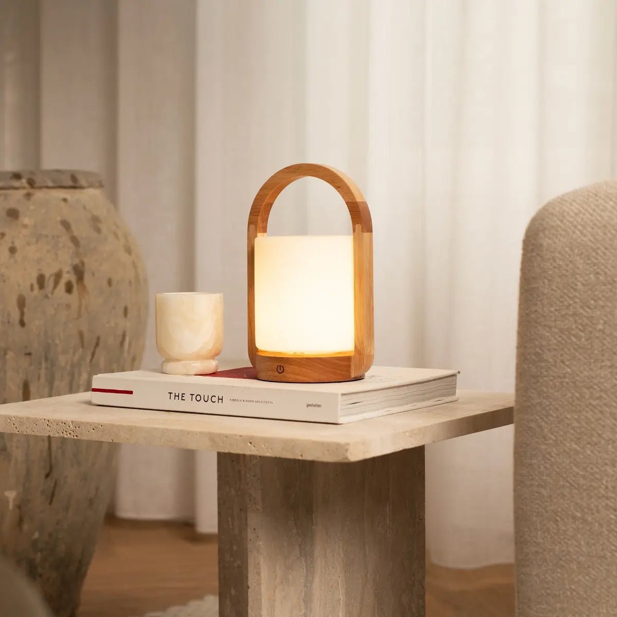 George Light Brown wireless lamp illuminating modern living room setting