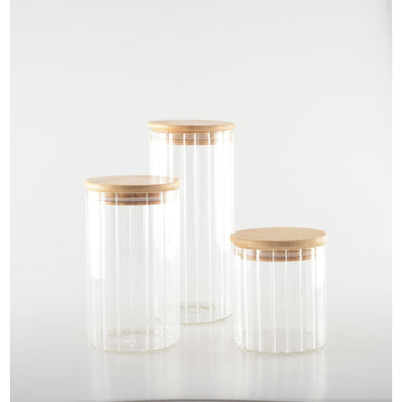 Elegant glass jar with natural wood cover for stylish storage