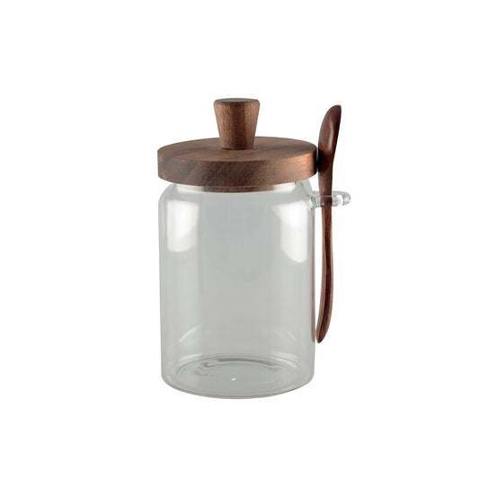 Clear glass sugar jar with wooden cover and matching spoon for stylish kitchen use