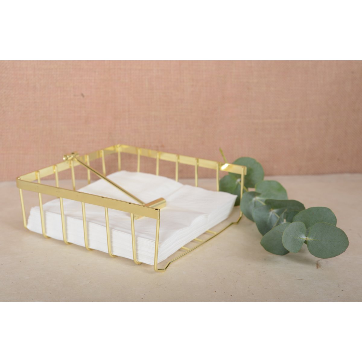 Minimalist golden square towel holder ideal for sophisticated tables