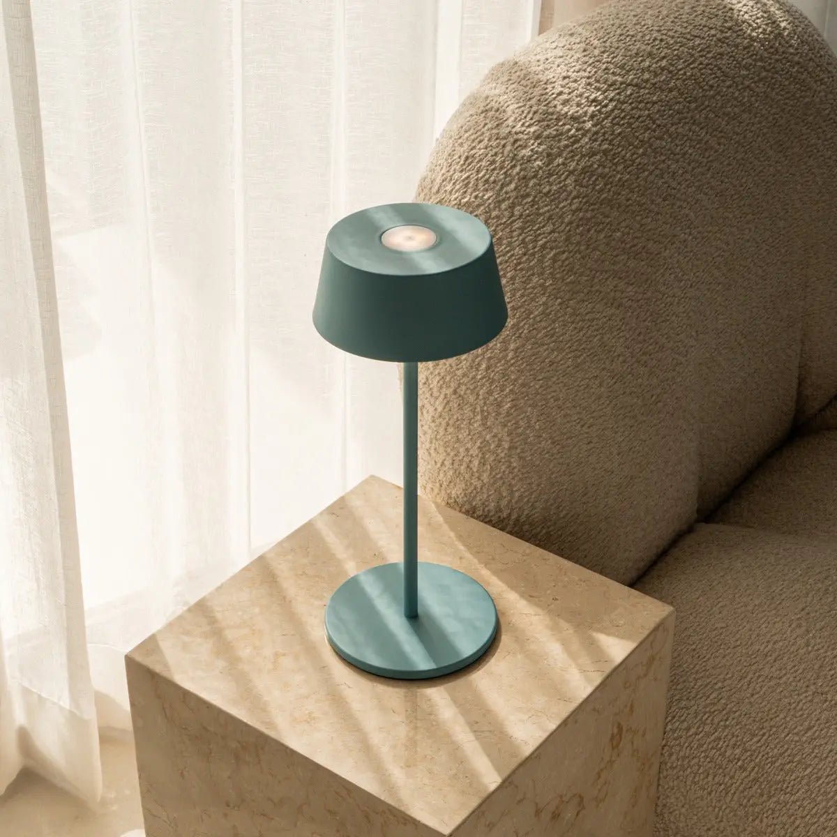 Stylish Hugo Amsterdams Blue Lamp adding elegant modern table illumination