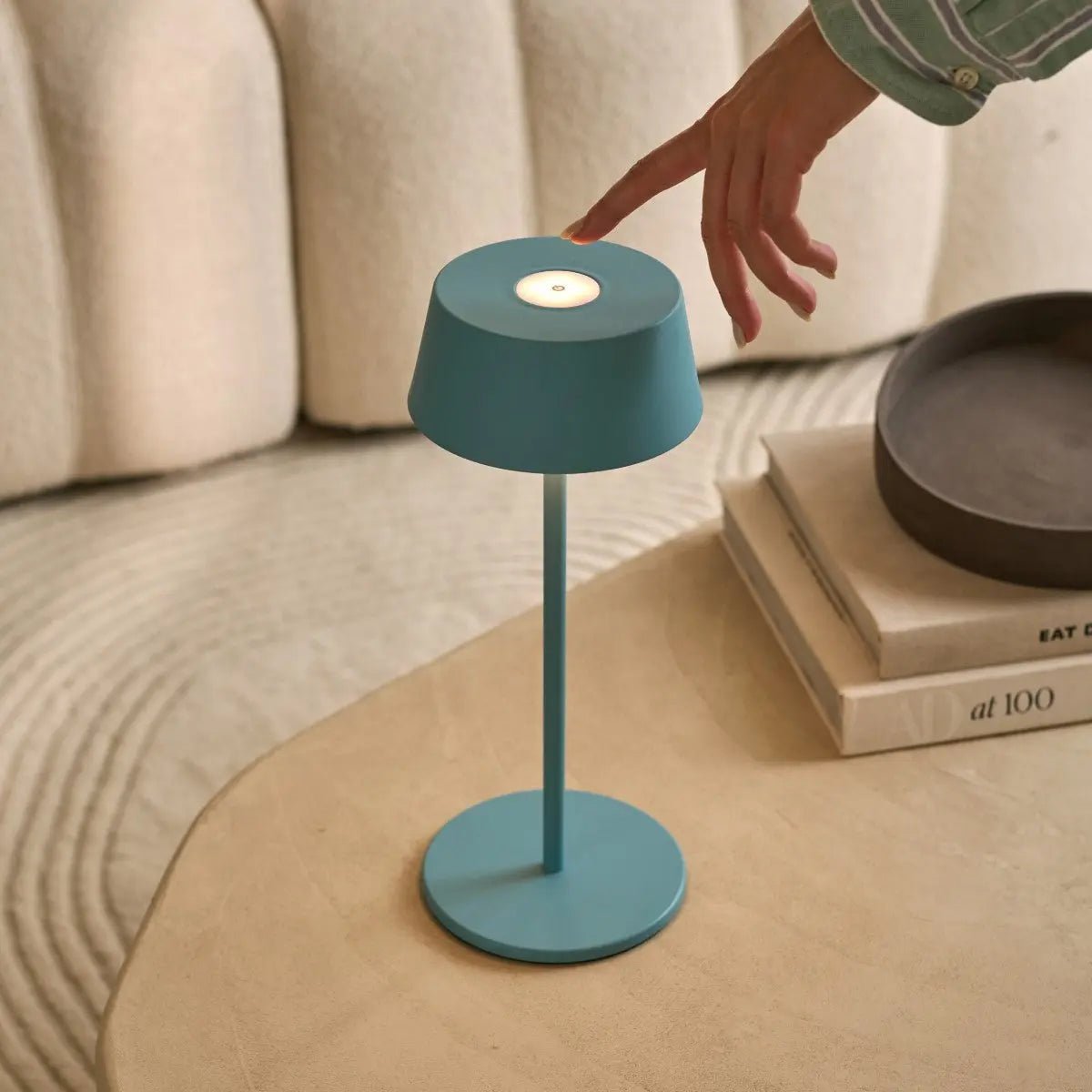 Sleek Hugo Lamp in blue color enhancing minimalist interior design