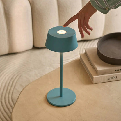 Sleek Hugo Lamp in blue color enhancing minimalist interior design