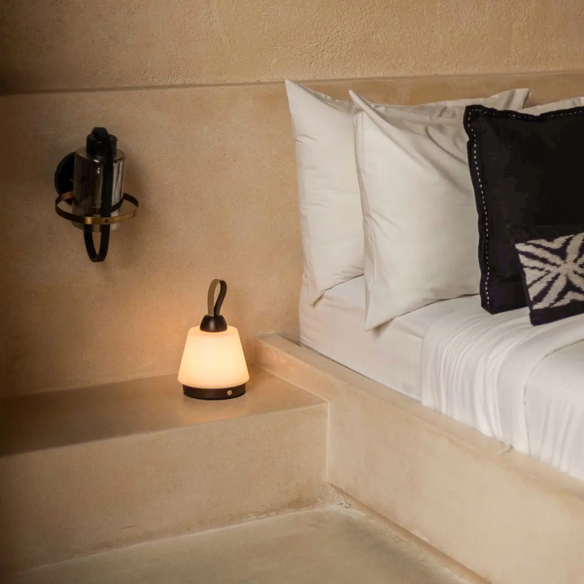 Liv Dark Brown cordless lamp placed on stylish bedroom night table