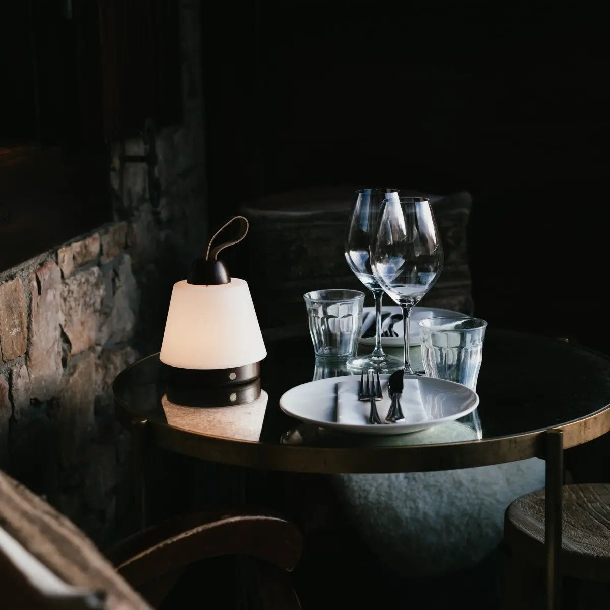 Liv Dark Brown rechargeable lamp adding warm light to dining table
