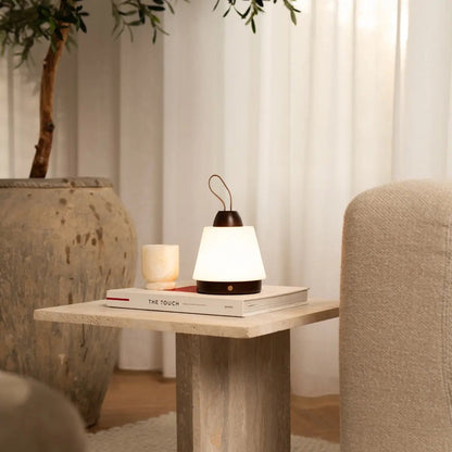 Liv Dark Brown wooden lamp adding charm to home interior decor