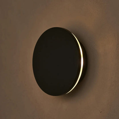 Lou rechargeable cordless wall light mounted on textured wall