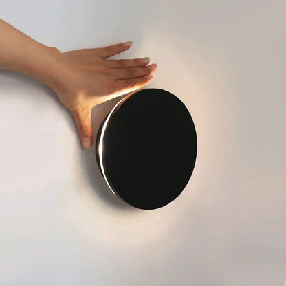 Lou touch dimmable black wall light for minimalist interiors