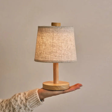 Rover Light Brown cordless lamp shown in elegant handheld design