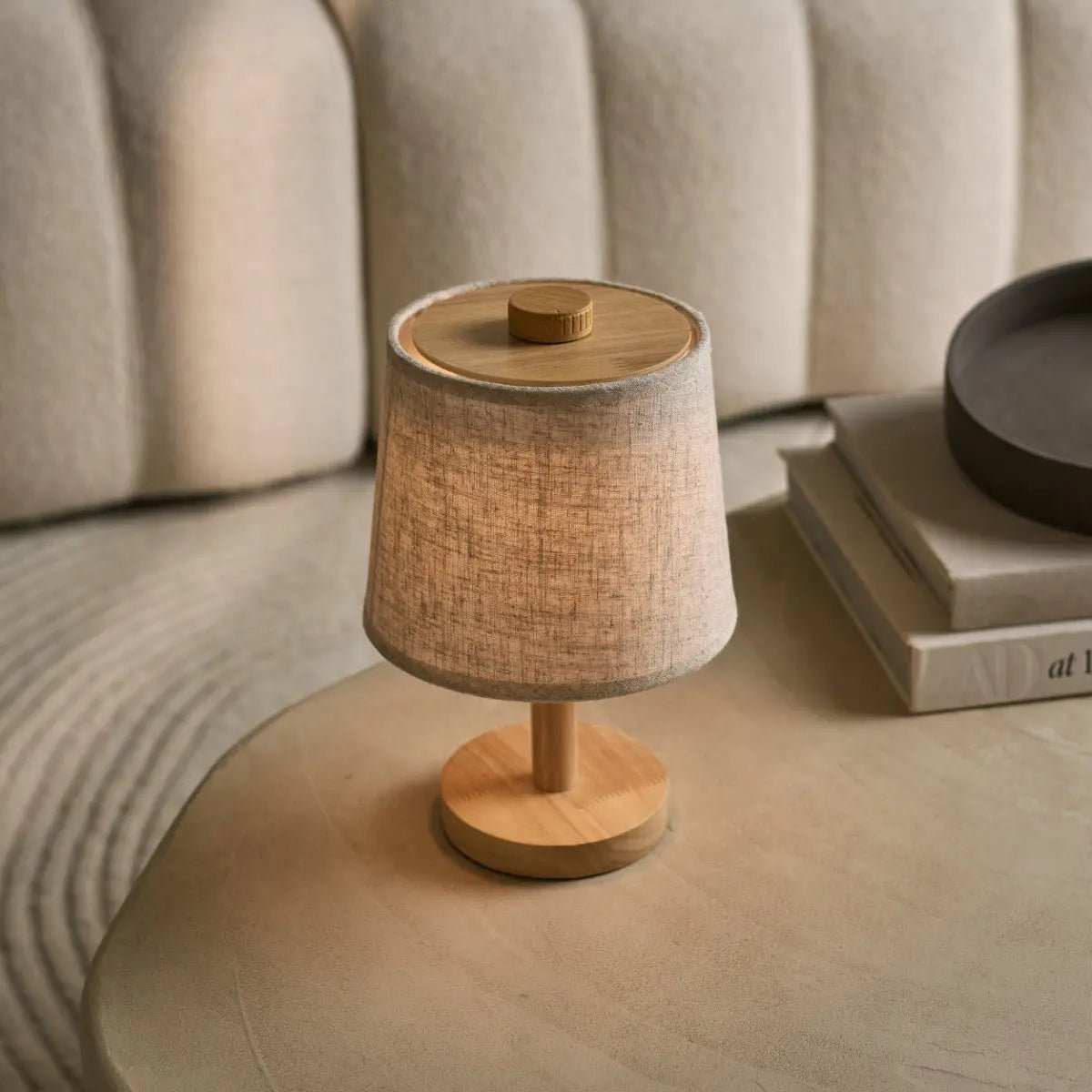 Rover Light Brown dimmable lamp placed beside modern sofa setup