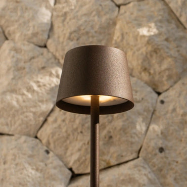 Vondel Mocha Brown cordless lamp spreading warm cozy glow