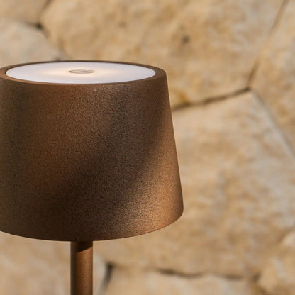 Vondel Mocha Brown LED table lamp providing ambient warm light