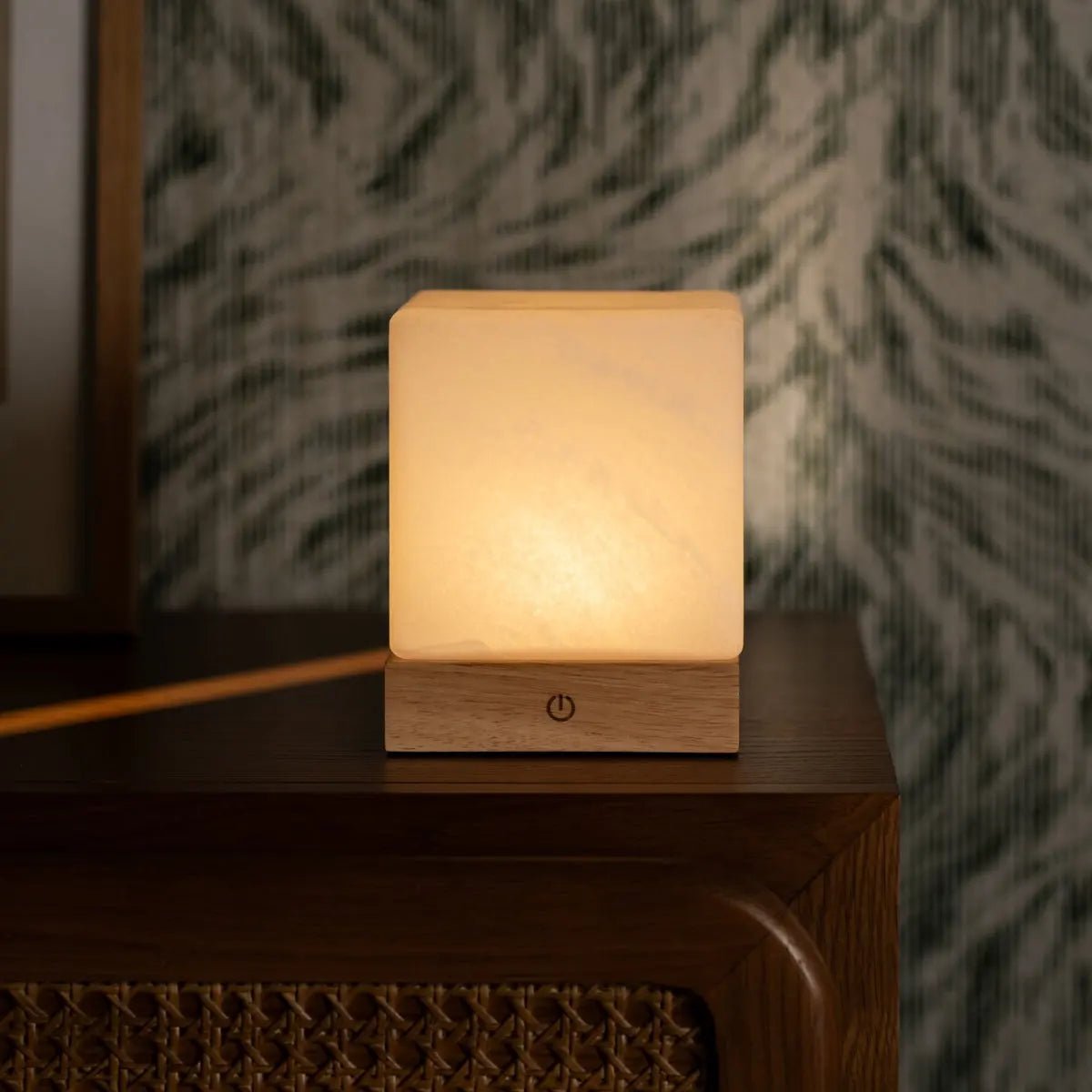 Yce Light Brown dimmable lamp providing soft light on bedroom side table