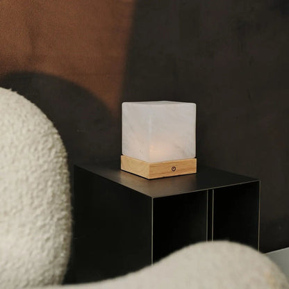 Yce Light Brown wooden lamp placed beautifully on marble surface
