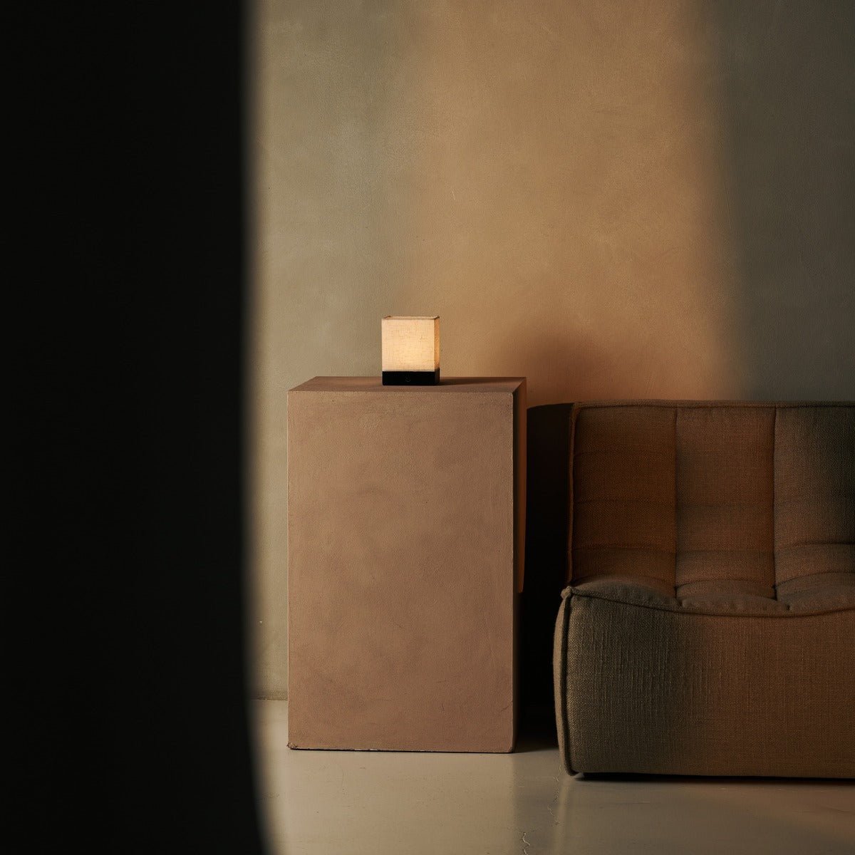 Zano Black rechargeable lamp creating relaxing bedroom ambiance