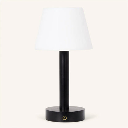 Zoë Black rechargeable lamp adding elegance to minimalist home office