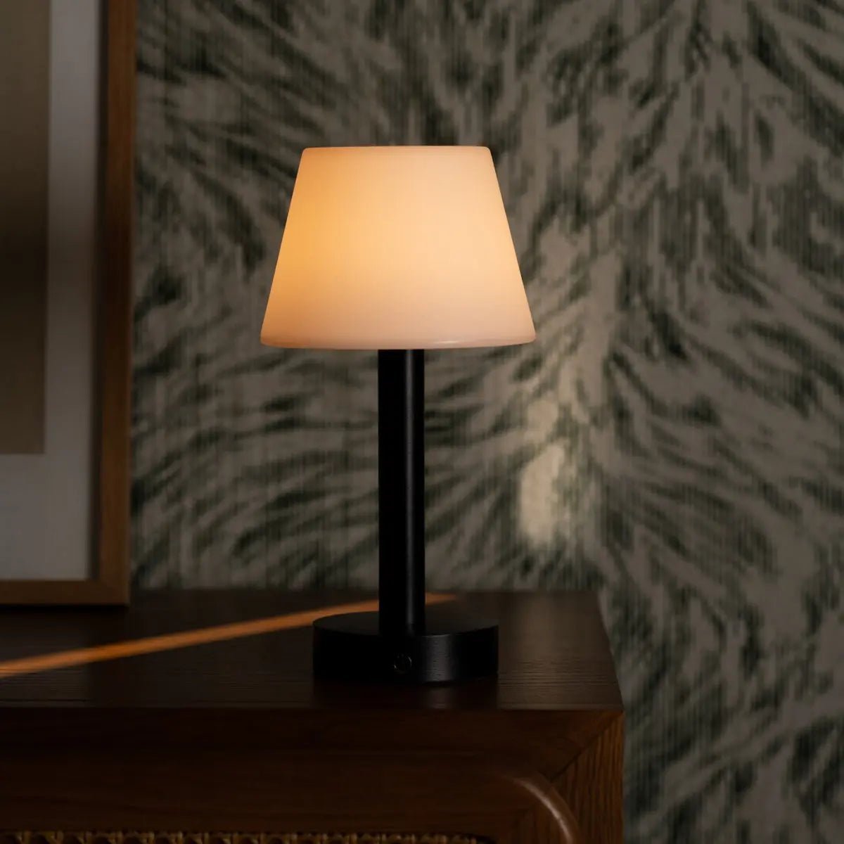 Zoë Black wooden lamp creating relaxing bedroom lighting ambience