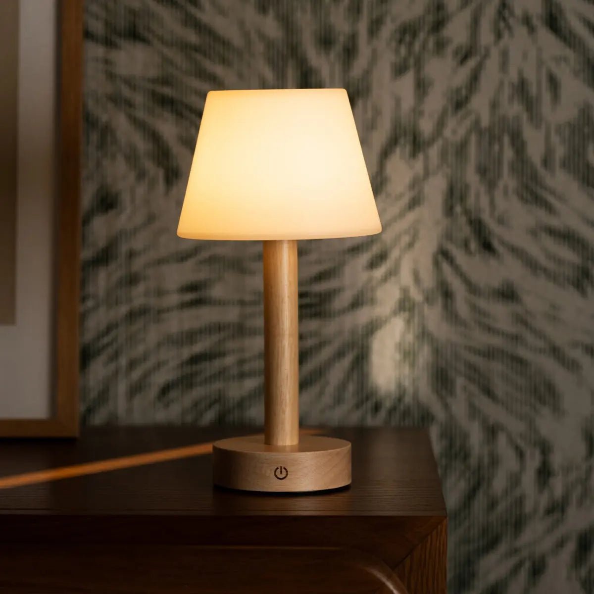 Zoë Light Brown cordless lamp providing warm light in night scene