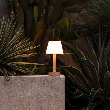 Zoë Light Brown cordless lamp illuminating outdoor evening space
