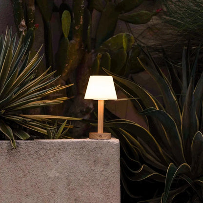 Zoë Light Brown cordless lamp illuminating outdoor evening space