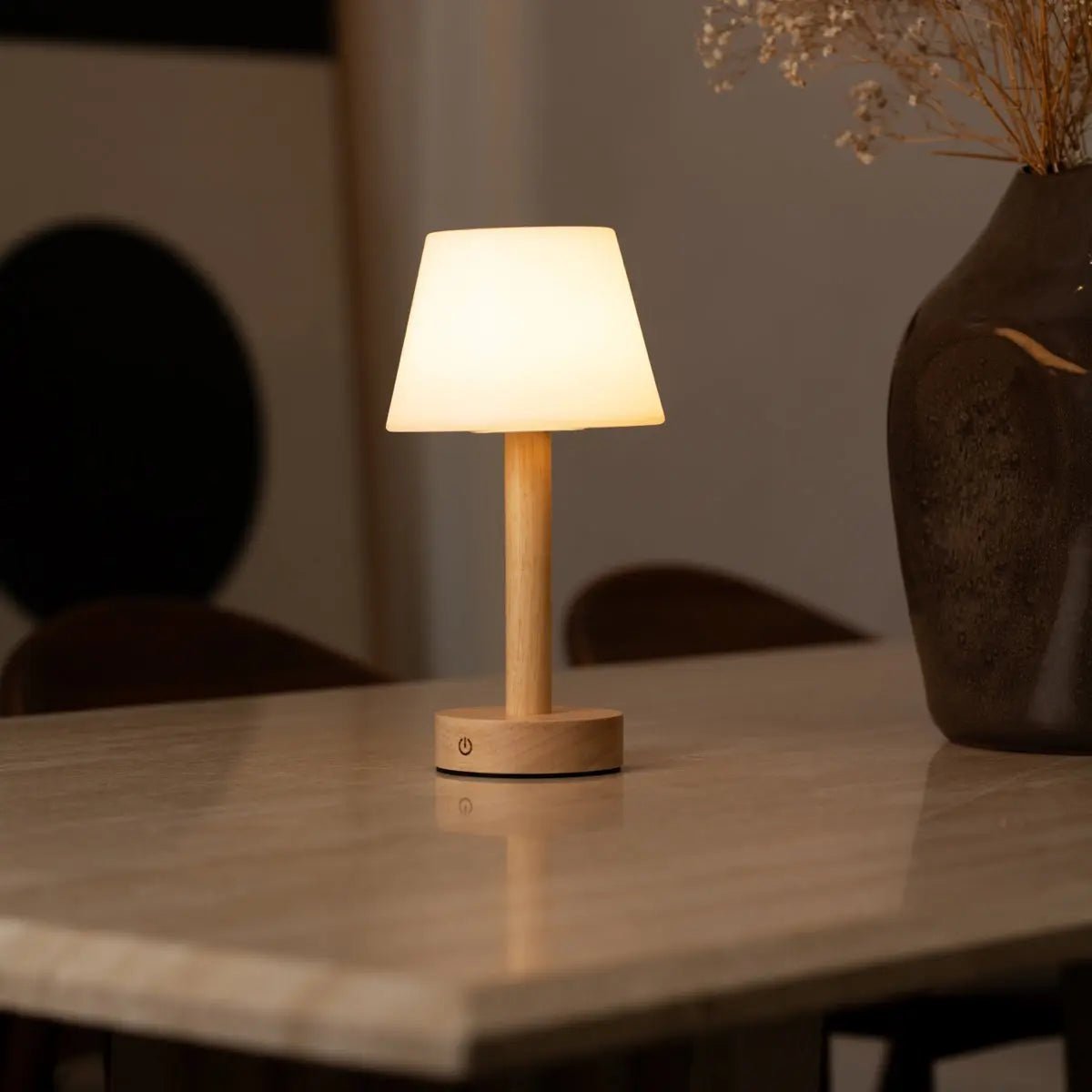 Zoë Light Brown wooden lamp softly lighting up bedroom table