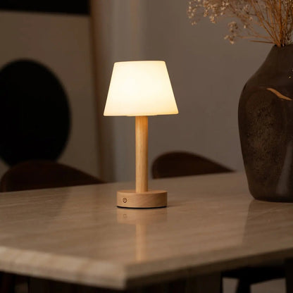 Zoë Light Brown wooden lamp softly lighting up bedroom table