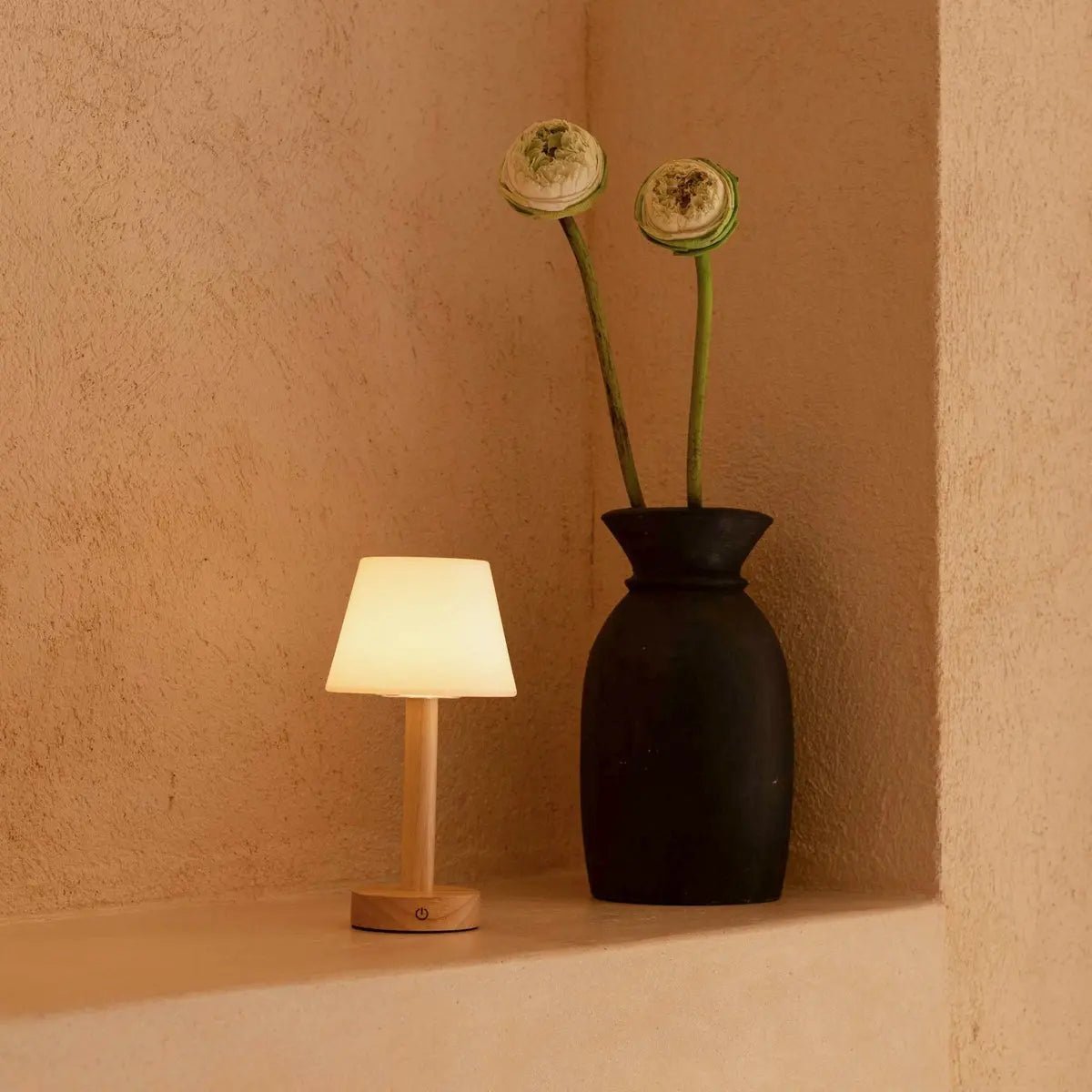 Zoë Light Brown wooden lamp placed beside decorative vase display