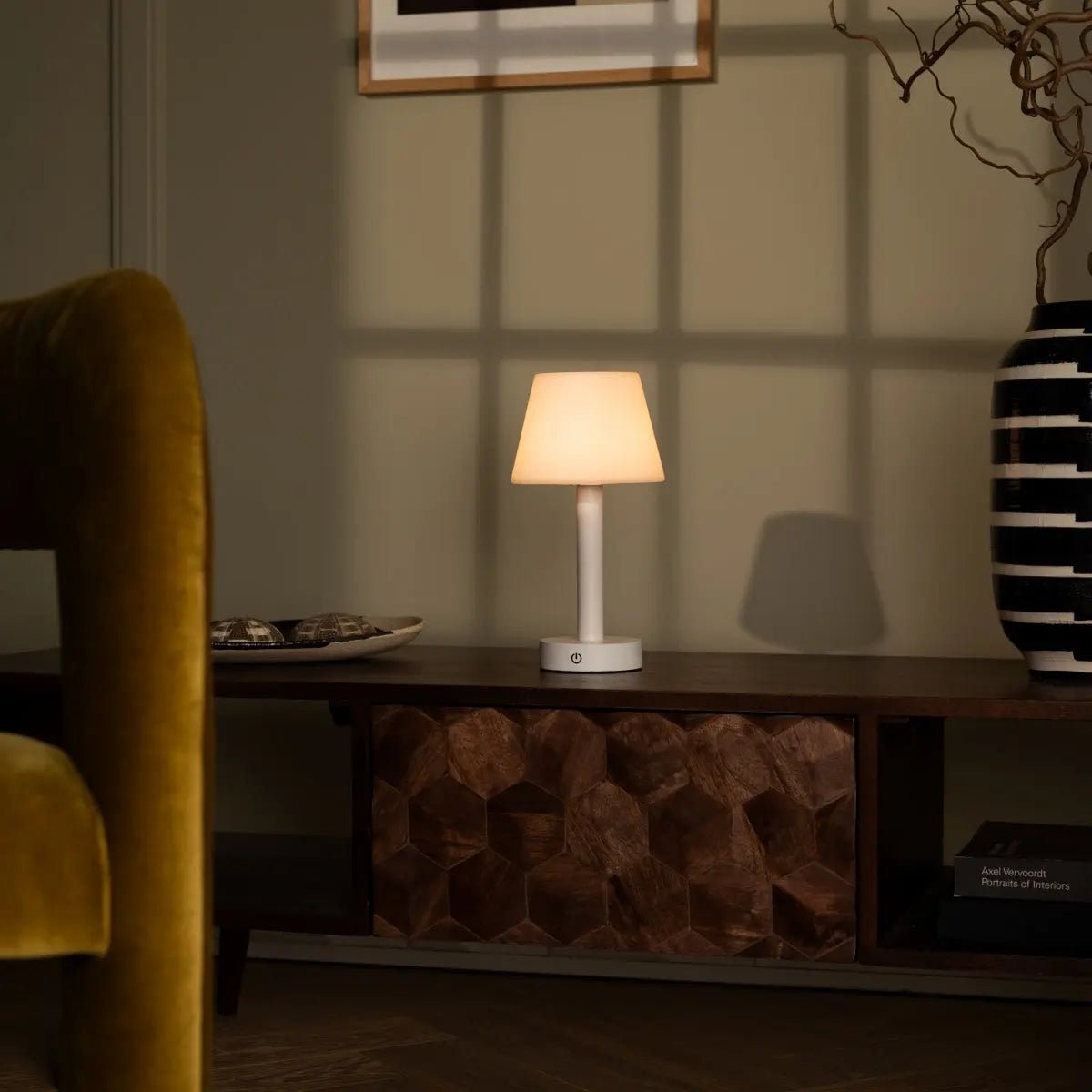 Zoë White dimmable lamp illuminating stylish elegant home decor