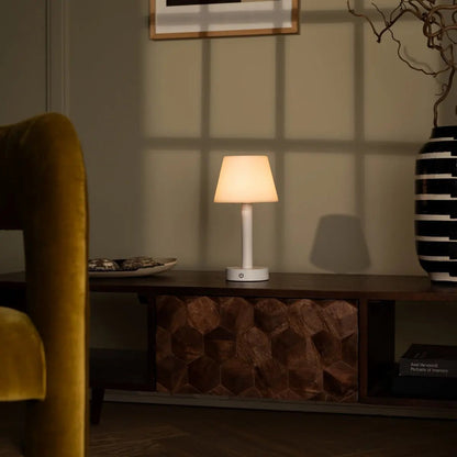 Zoë White dimmable lamp illuminating stylish elegant home decor