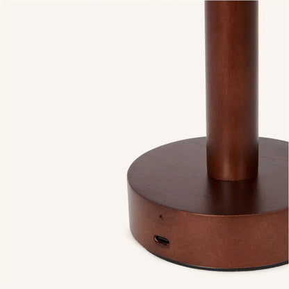 Zoe Dark Brown Wooden Lamp used as stylish living room lamp