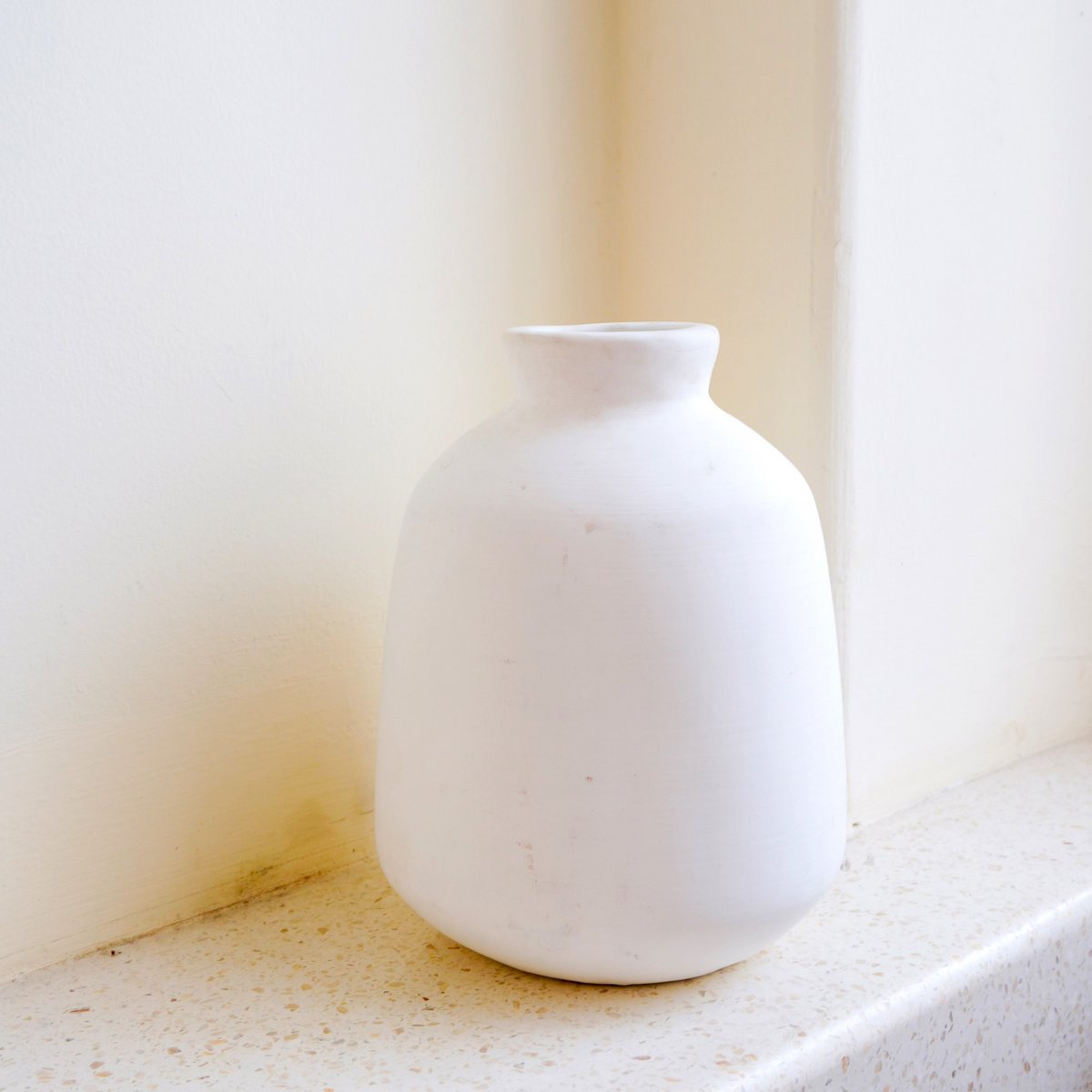 Bawa clay basket vase for elegant shelf or table decor